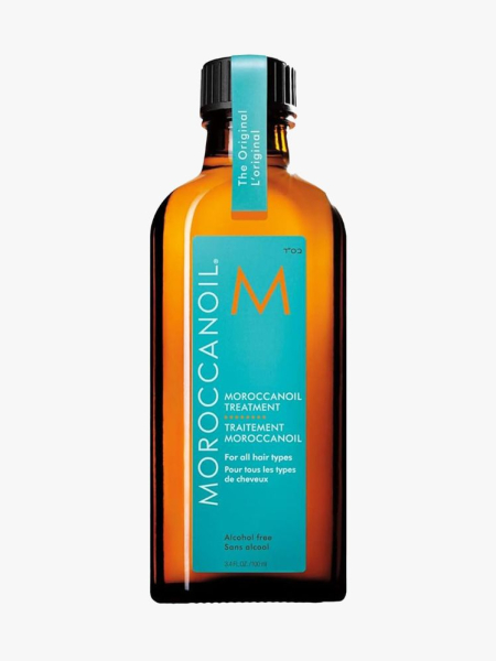 Moroccanoil Treatment Original amber bottle with turquoise label on light gray background