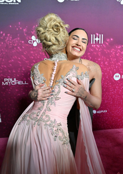 Demi Lovato hugging Paris Hilton